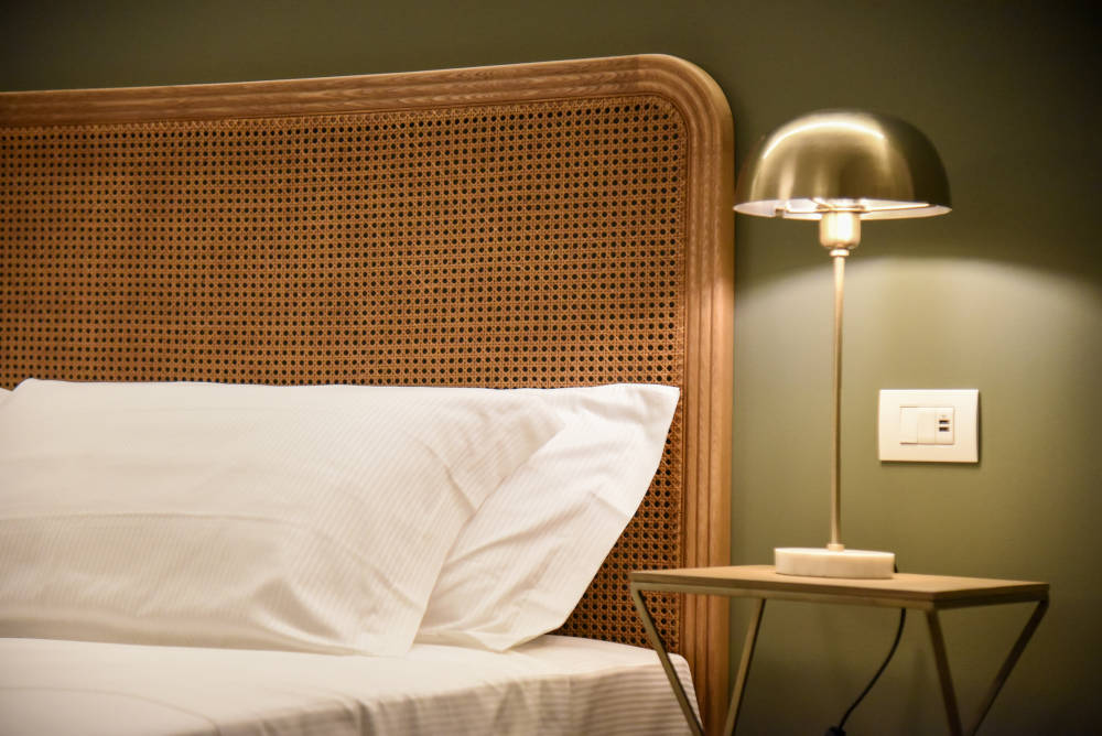 Una foto del letto della camera superior di Tenuta Acquaviva